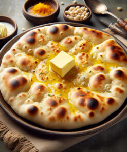 Our Butter Naan is a testament to freshness, made from scratch and slathered with high-quality butter as soon as it comes out of the tandoor. Prepared in a hygienic environment, it offers a rich, melt-in-your-mouth experience, enhancing the flavors of any dish it’s paired with.