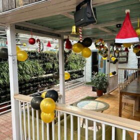 The main hall, with its inviting decor and vibrant vibe, stands at the core of our restaurant's unique dining experience.